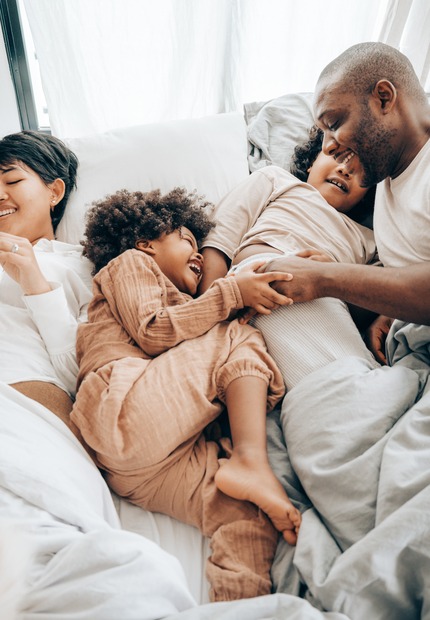 Photo of a Family in Bed